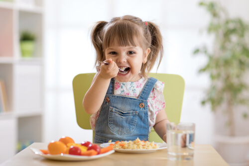 Child eating in the kitchen