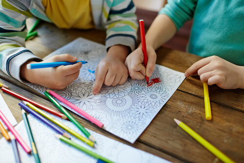 children drawing mandalas for art therapy